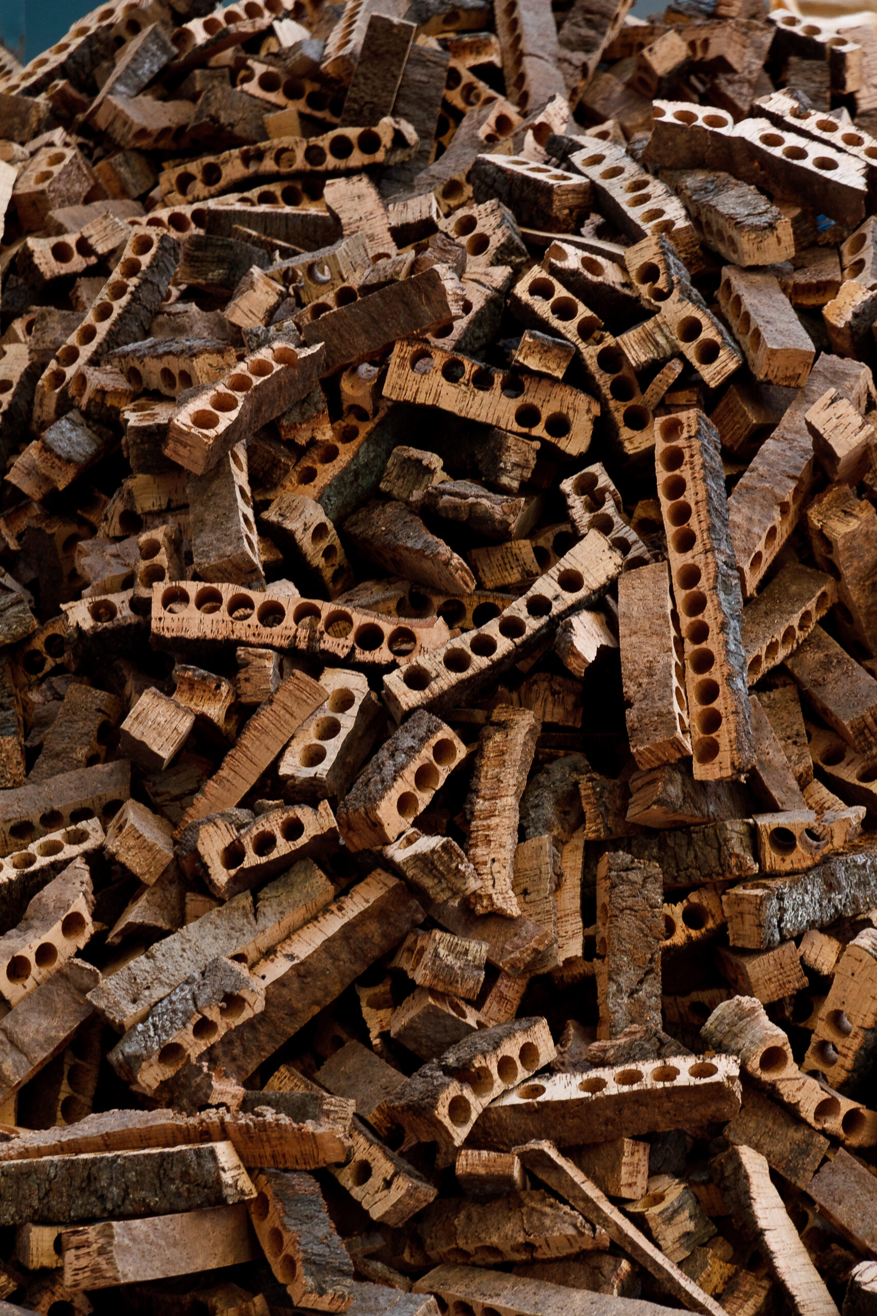 Production starts with the receipt of raw cork, including weighing, quality checks, and proper storage to ensure traceability and optimal preservation.